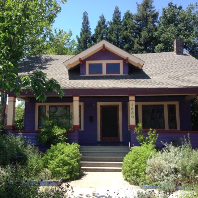 Exterior house painting in Sacramento, CA by Baldwin Custom Painting — brown craftsman bungalow with covered porch