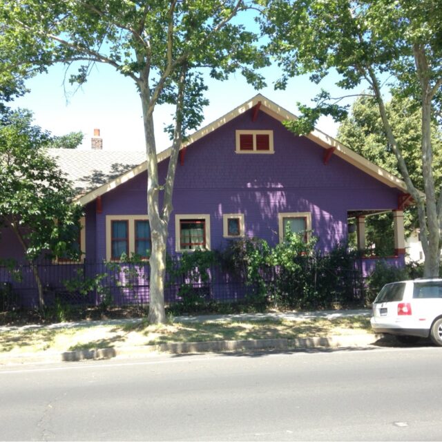 Exterior house painting in Sacramento, CA by Baldwin Custom Painting — lavender bungalow with white trim