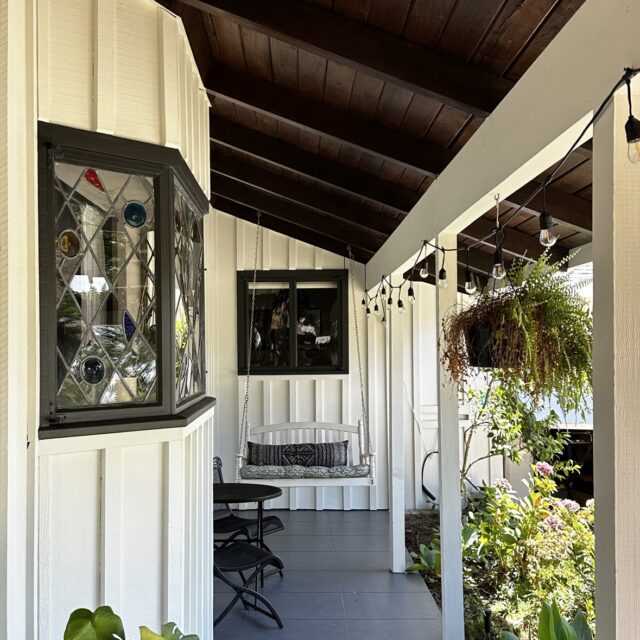 Exterior house painting in Sacramento, CA by Baldwin Custom Painting — white single-story home with columned porch