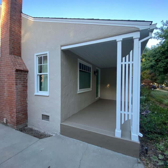 Exterior house painting in Sacramento, CA by Baldwin Custom Painting — beige stucco home with covered patio and brick chimney