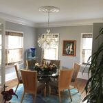 Living room fireplace mantel with holiday decor and built-in shelving