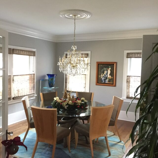 Interior house painting in Sacramento, CA by Baldwin Custom Painting — ceiling detail with crystal chandelier, decorative ceiling medallion and crown molding
