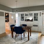 Bedroom with gray walls and white trim
