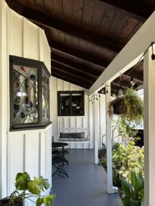 Wood staining in Sacramento, CA by Baldwin Custom Painting — porch with dark stained wood ceiling and beams